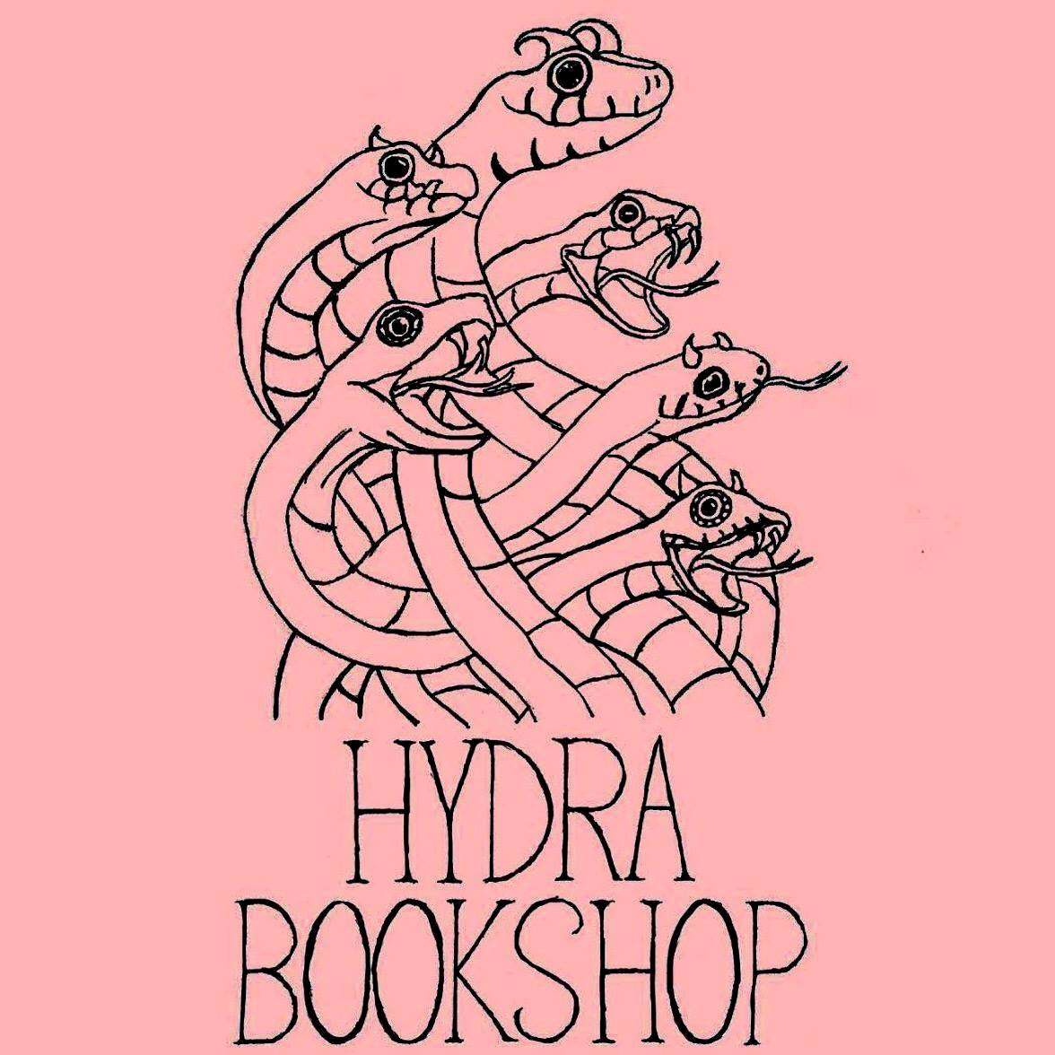The logo of Hydra Bookshop, depicting a hydra with multiple heads on a pink background. The illustration is detailed with each head having a distinct expression, representing the bookshop's multifaceted approach. © Hydra Bookshop